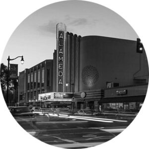 Downtown Alameda with the Theater and Alameda Large Neon Sign in the Evening