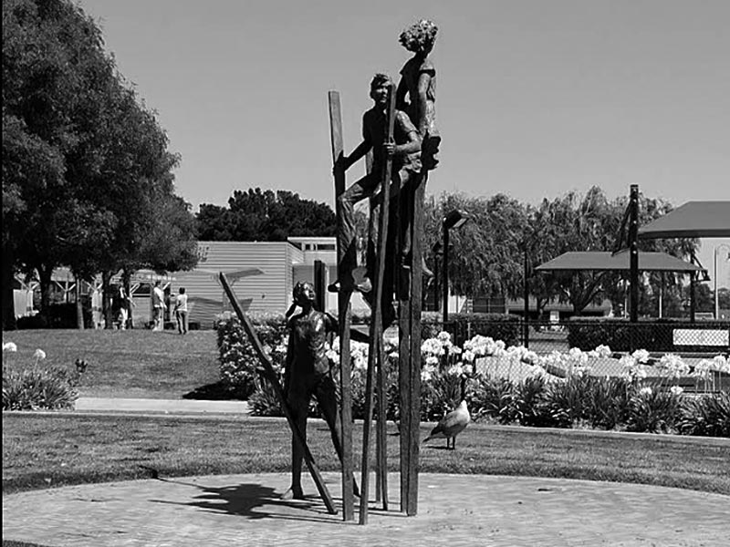 Stilt Walkers sculpture in Foster City, CA by Dennis Von Smith